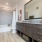 Spacious Bathroom with Storage Cabinetry