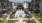 aerial view of a swimming pool in a courtyard between buildings